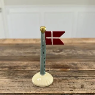 keramik flag med teksten tillykke