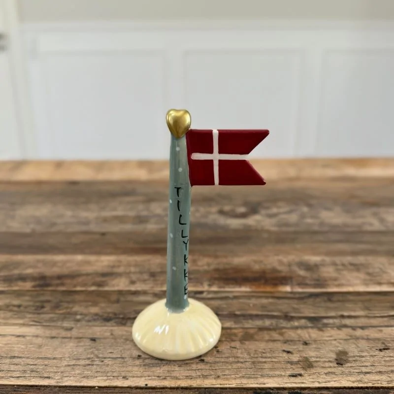 keramik flag med teksten tillykke