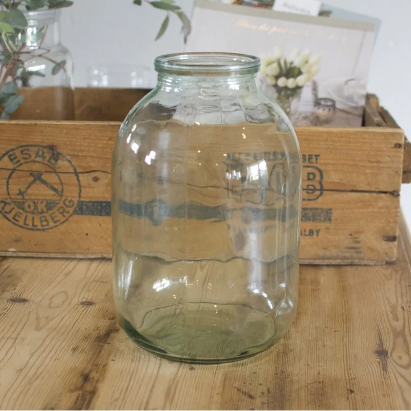Stor glasvase i klar glas med grønligt skær